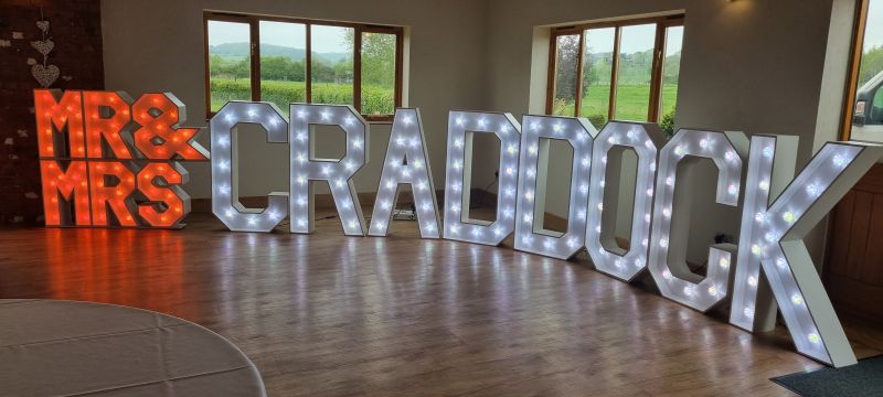 Illuminated letters spelling any surnames