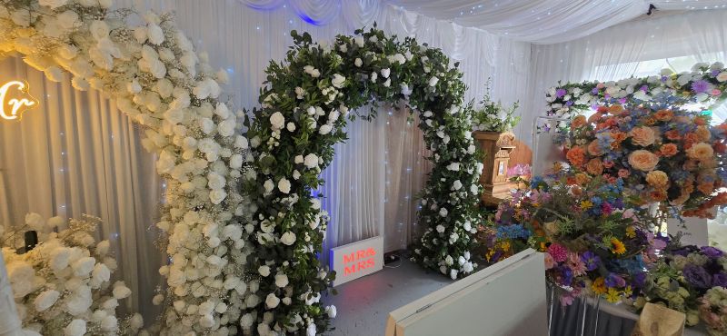 large green and white arch
