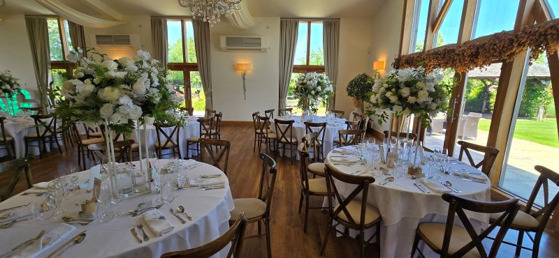 green and white decor for tables at Mythe Barn
